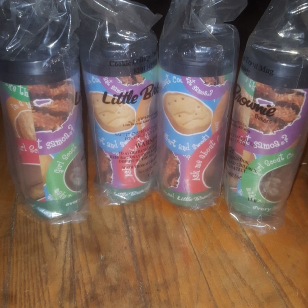 Four girl scout cookie mugs